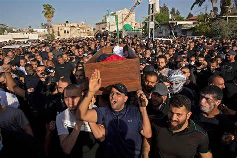 Iran Holds Emotional State Funeral for Victims of Israel Conflict