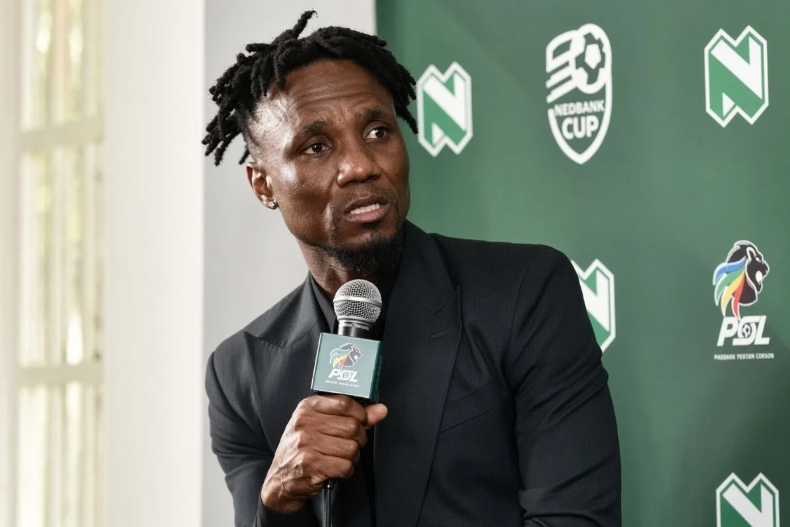 The General’s Warning: Modise Urges PSL Stars to Ditch Flamboyance and Benchmark Themselves Against Themba Zwane